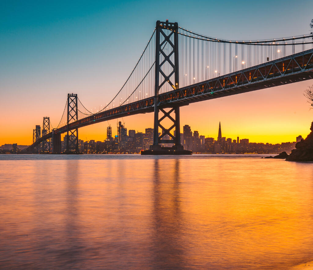 Tectonic Law PC logo 3 San Francisco Bay Bridge skyline at sunset